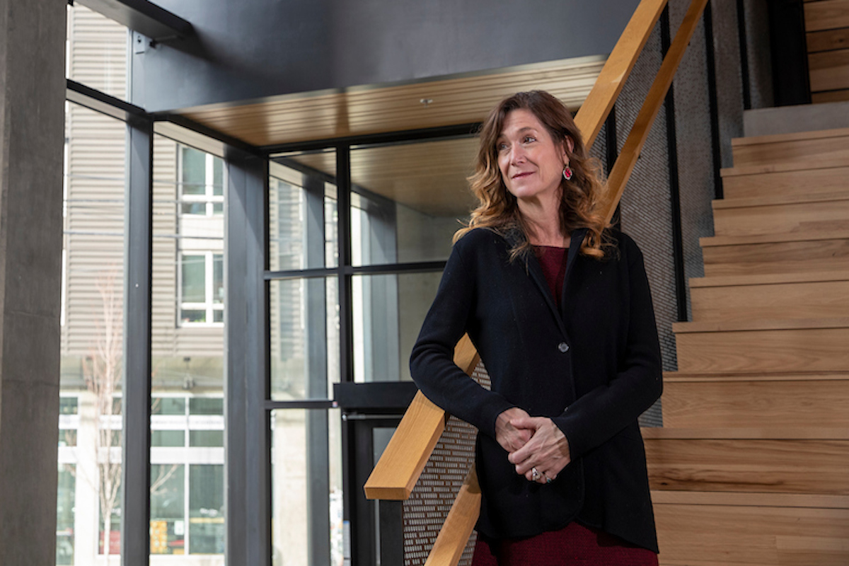 Melore Nielsen, photographed on the staircase in the library.