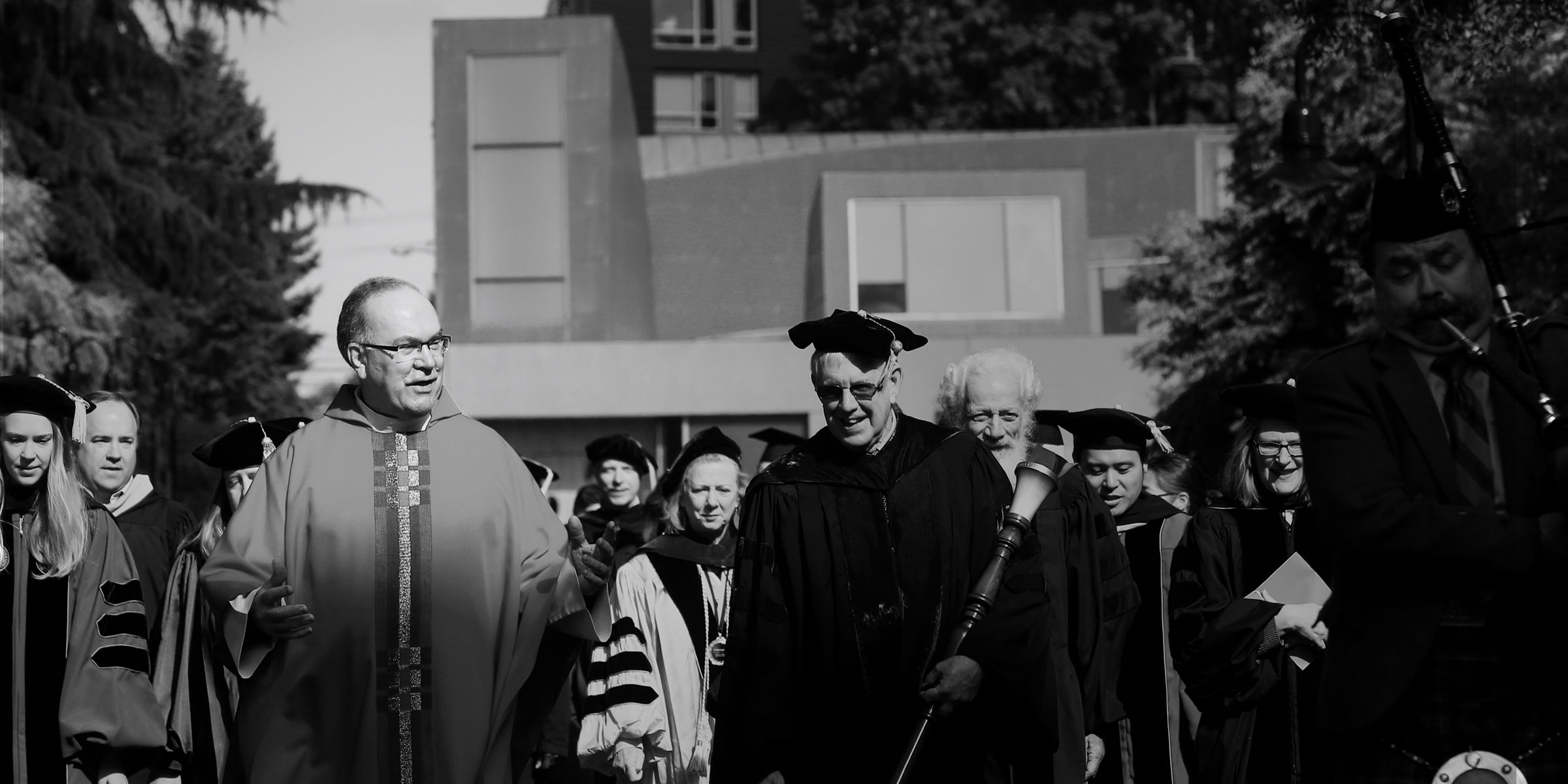 A photograph of Father Steve and Seattle University community members leading Mass of the Holy Spirit.