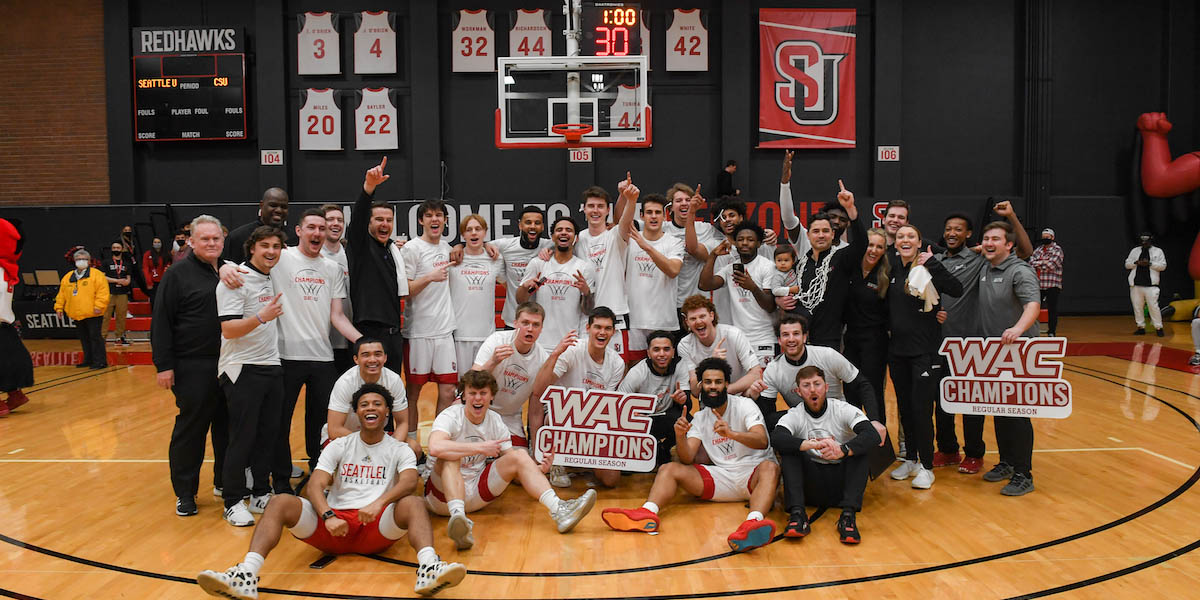 Men's basketball posing as WAC champs.