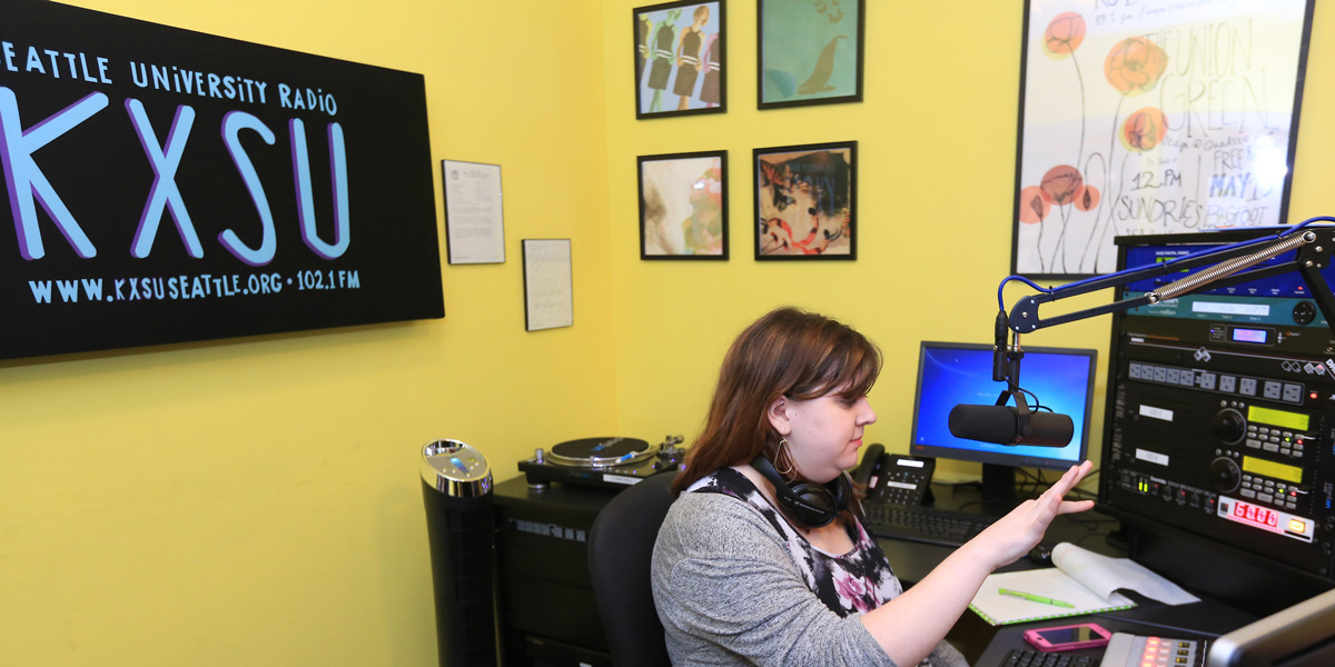 A student preparing to air KXSU