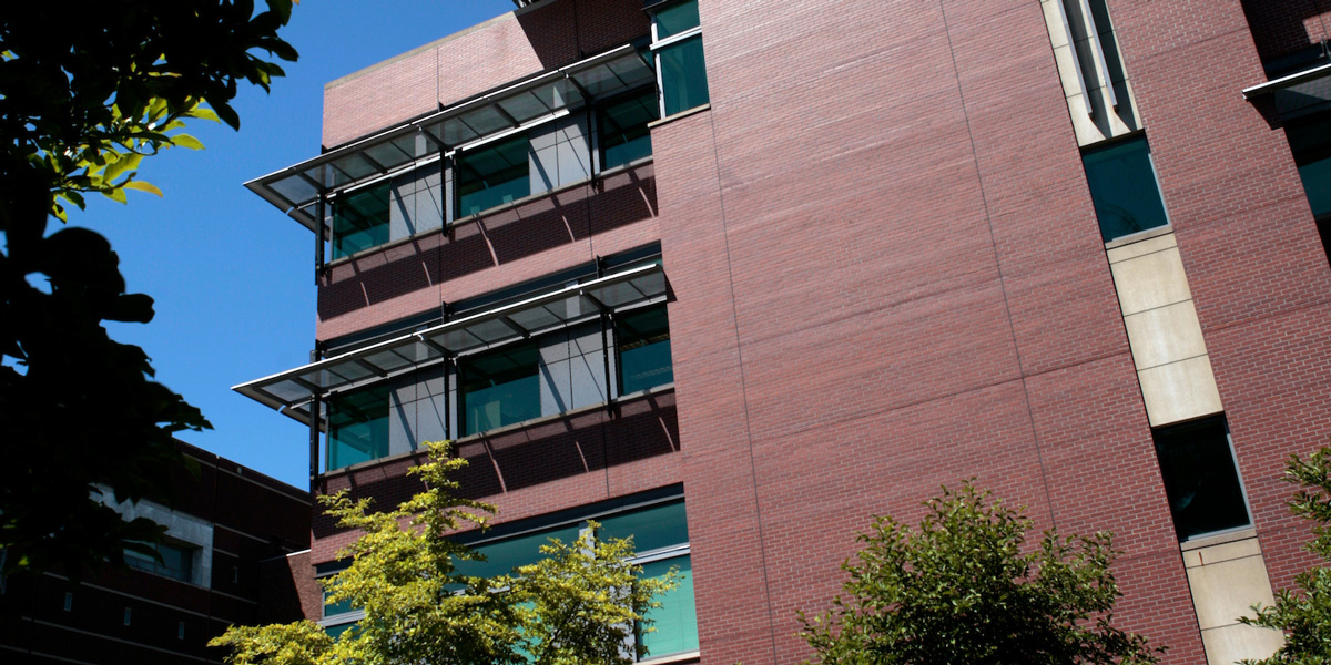 Exterior view of Sullivan Law School on a sunny day