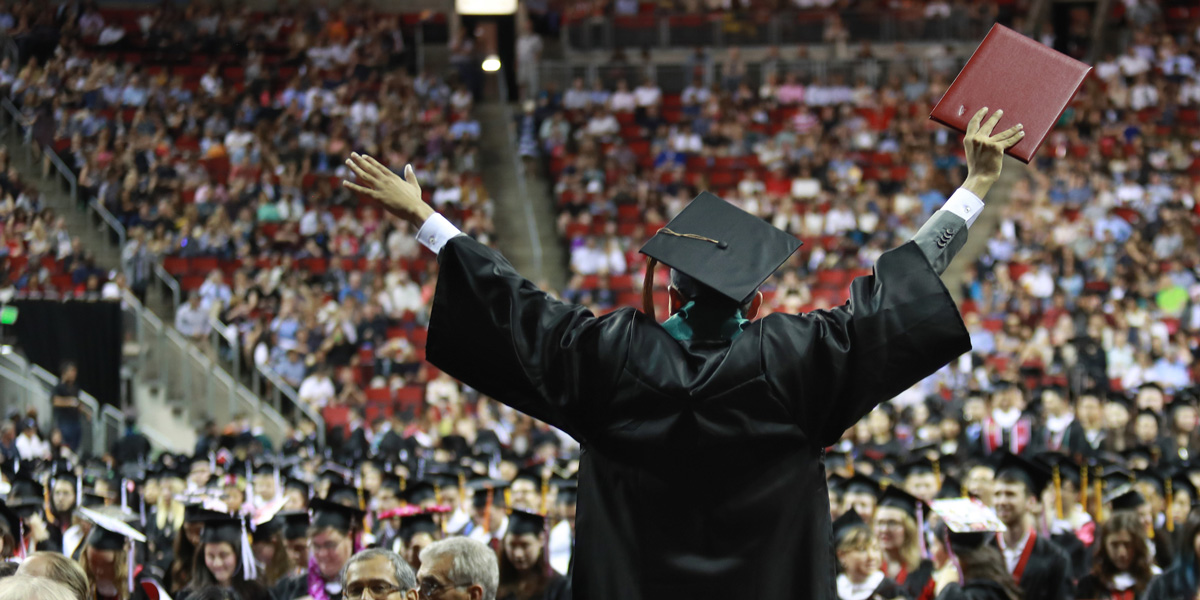 crowd of students at commencement ceremony