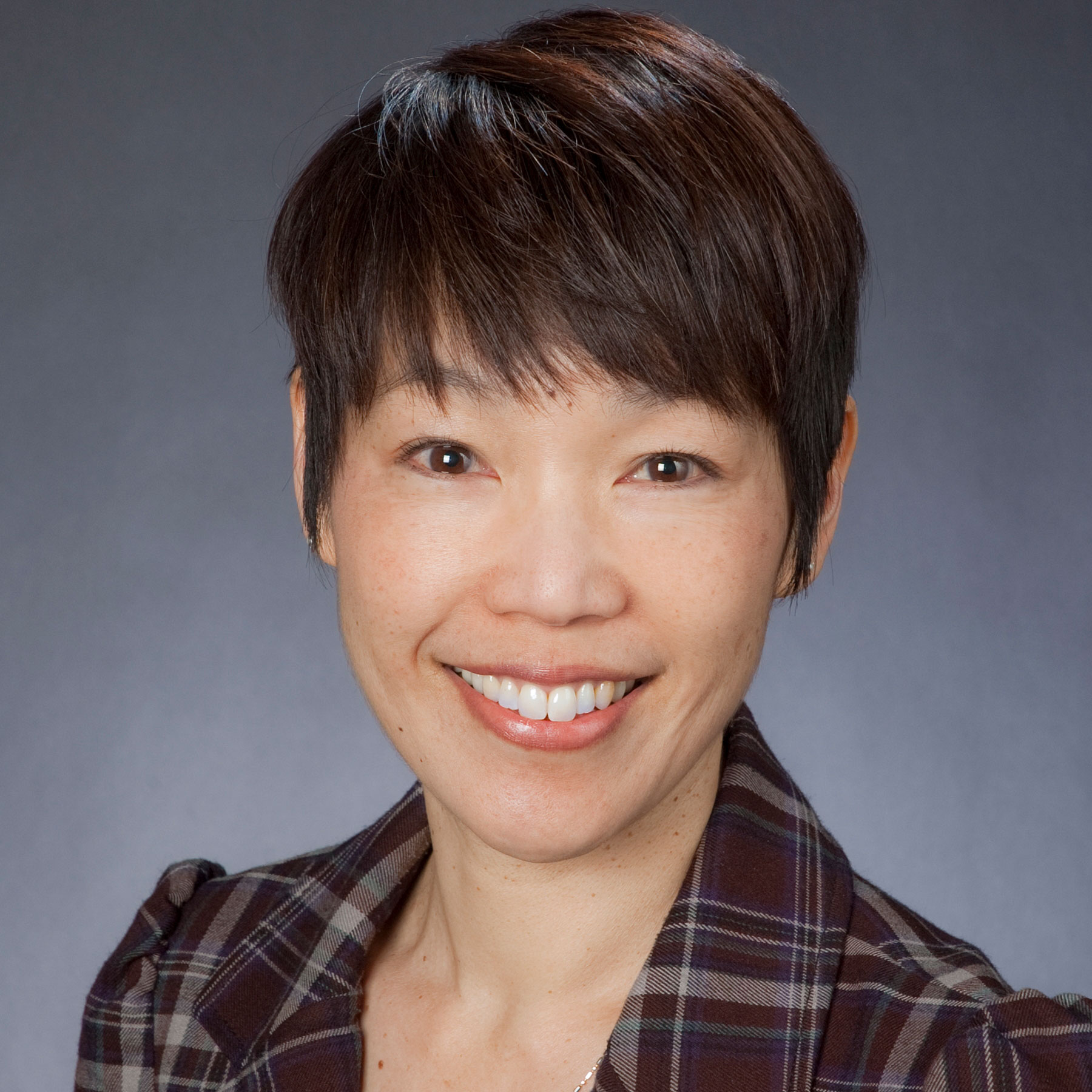 headshot of Joanie Ching