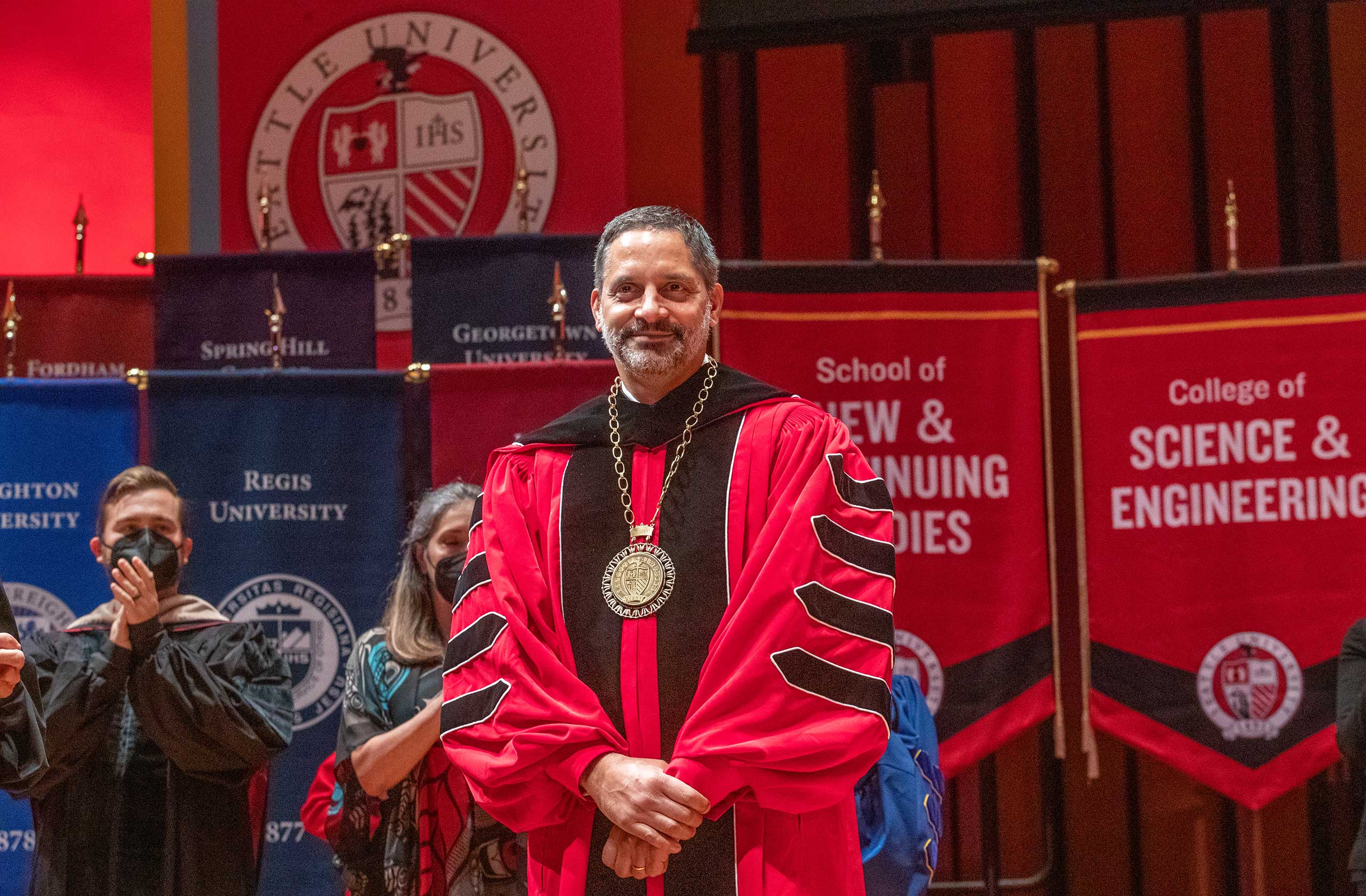 President Eduardo accepts the medal of Seattle University President