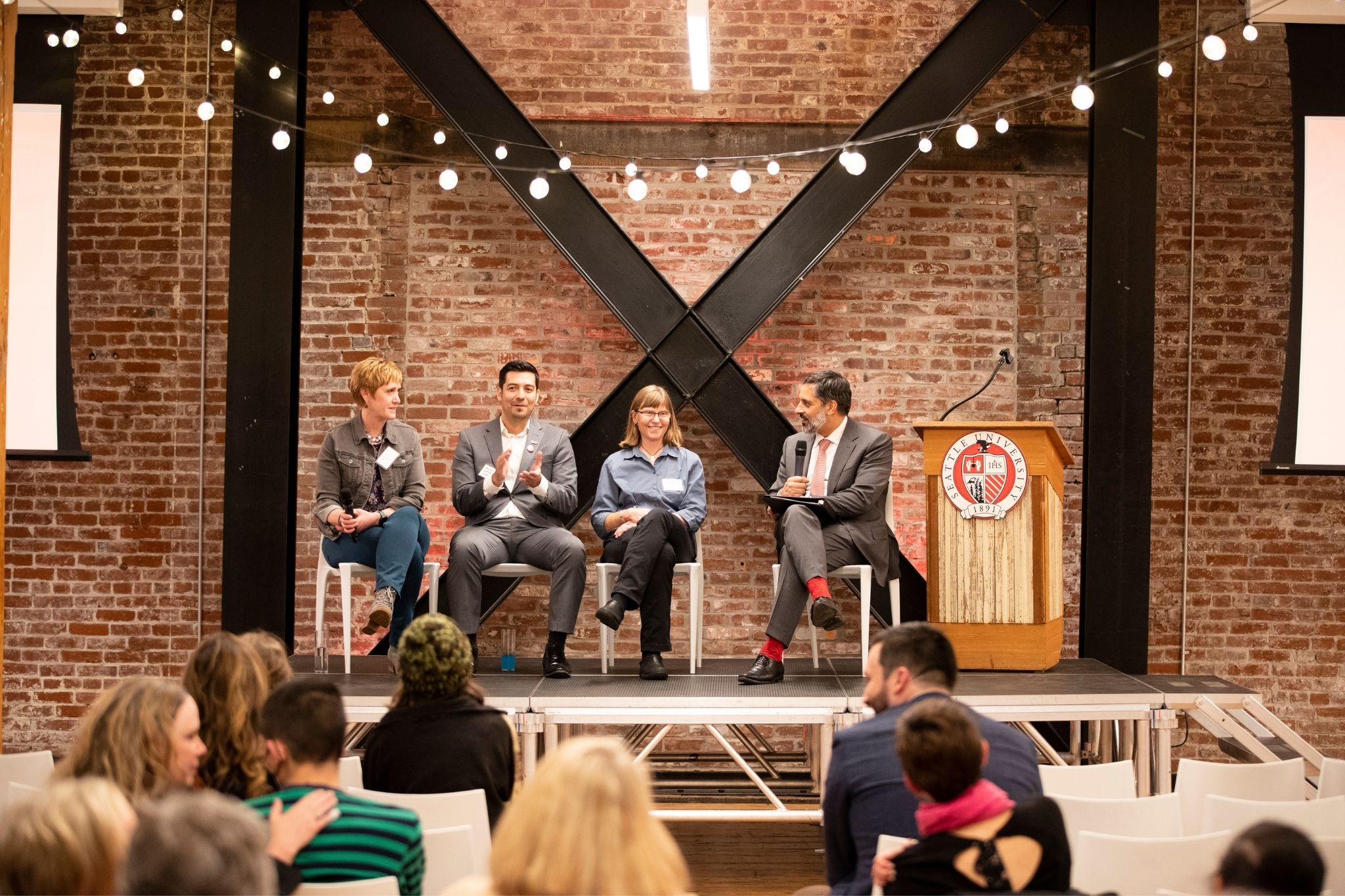 Melissa Dugan, ’90, Brian Gonzales, ’00, Maylon Hanold, ’08, and President Peñalver