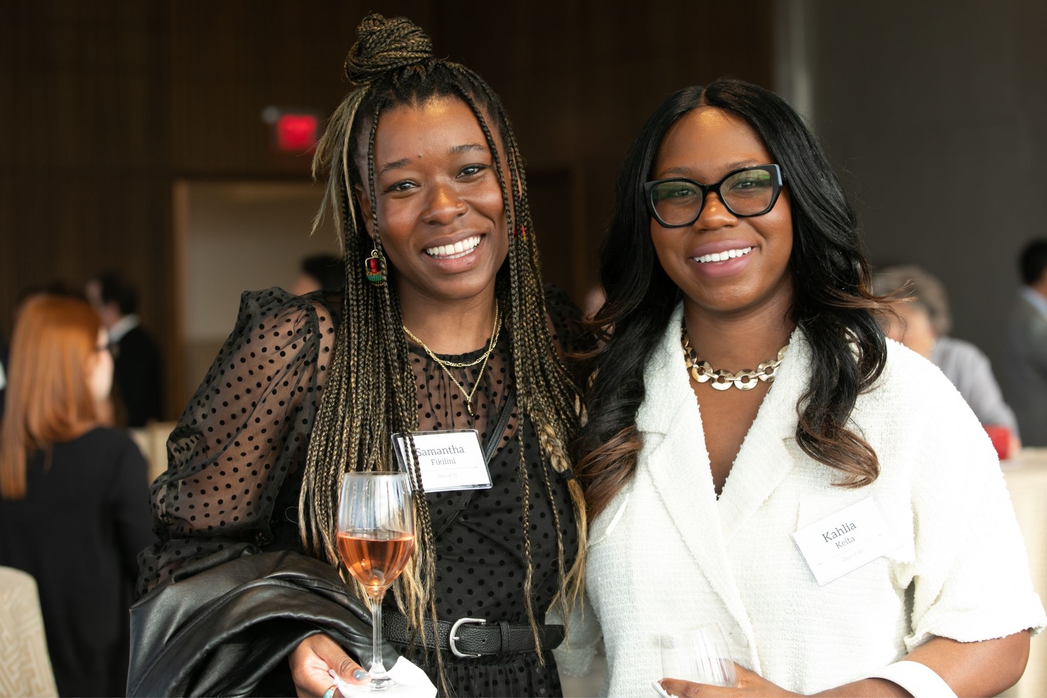 Samantha Fikilini, '13, and Kahlia Keita, '08